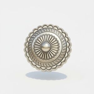 Western-themed silvertone accent for your leather gear. 1 ⅛” diameter
